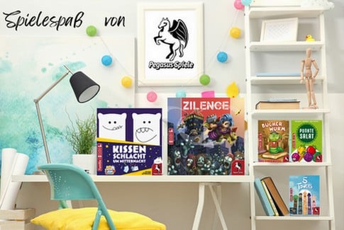 Spielespaß von Pegasus Spiele - Spiele auf einem Schreibtisch